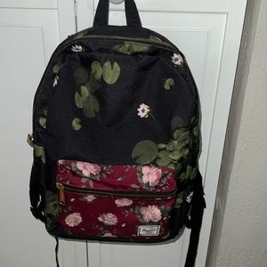 Gently used girls Herschel’s floral backpack.